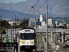 A Metro Rail Blue Line train approaches Slauson station in 2011