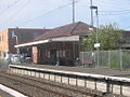 Northbound view of Platform 1 and station building, December 2005