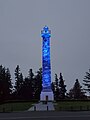 The column in blue lighting