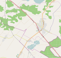 Mapa konturowa Knyszyna, blisko prawej krawiędzi znajduje się punkt z opisem „Cmentarz żydowski w Knyszynie”