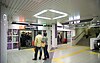 Passengers on the Tōzai Line platform at Yamashina Station in 2005