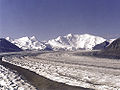 The Nabesna Glacier, with Mount Blackburn and its two summits at right; Atna Peaks is the twin summit left of center