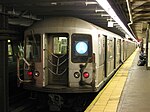 An A train composed of R40M and R42 cars at 168th Street station in 2008