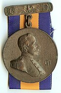 Voorzijde van de Dewey Medal