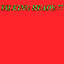 A red cover with "TALKING HEADS: 77" written at the top in green