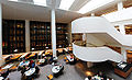 Interior of the British Library designed by Colin St. John Wilson, with the enclosed, smoked glass King's Library at its centre.