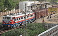 A WAG5 Loco with a freight train at Kathivakkam railway station