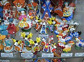 Bir mağazada Dymkovo oyuncaklar