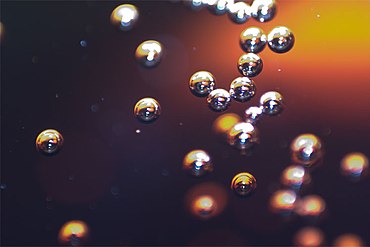 Macro-photograph of Coca Cola bubbles