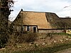 Boerderij met achterbaander, underschoer en aangebouwde houten bijschuur