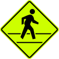 W10F Pedestrian crossing ahead. This fluorescent green version is unofficial.