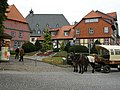 Schiefes Haus mit Blumenuhr in Wernigerode