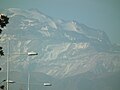 Cerro El Plomo from Apoquindo Ave., partially occluded by Cerro Leonera.