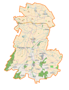 Mapa konturowa gminy Kondratowice, blisko centrum na dole znajduje się punkt z opisem „Maleszów”