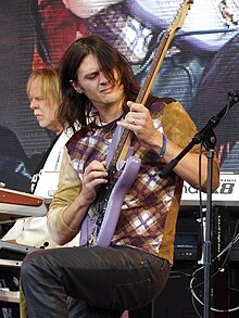 Colquhoun performing with Rick Wakeman in 2010.