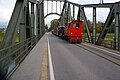 Heritage train on the Wiesenrain bridge over the Alpine Rhine