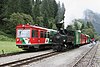 Murtalbahn railcar VT31 and steam engine U.11 meet at Ramingstein-Thomatal station in 2005