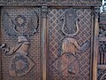 Coats of arms on the wall paneling of the knight hall.