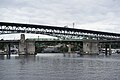 The bridge viewed from the east, with Ship Canal Bridge in the background.