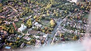 Aerial view of Shrivenham seen from a glider. St Andrews Church is to the left.