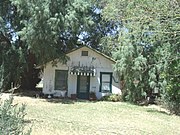 The Judd House was built in 1915 and is located at 1208 S. Farmer Ave. in Tempe, Az. This house was built by Alfred and Ellen Bell who acquired a twenty-five-acre farm in the southwest quarter of the northwest quarter of Section 21 (T1N R4E) in 1914. In 1938, Orion and Anna Judd became the owners of the house.