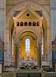 The Ciborium in front of the altar, with statues of angels on the corners