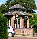 Game larder to the centre of the service court at Combermere Abbey