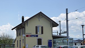 Two-story building with gabled roof