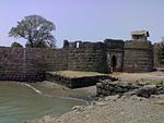 Kolaba Fort Containing i) Sarja Kot, ii) The North Causeway, iii) The Manik Chawda, iv) The South causeway, v) The Talghar, vi) The Padmawati Shrine, vii) The Temple of Gulbai or Mahishasuri, viii) The Shrine of Bhawani, ix) The Nanisahib's Palace, x) The Thorla wada, xi) The Reservoir Apsaras, xii) The Temple of Ganpati-Panchyatan, xiii) The Temple of Mahadeo, xiv) The Shrine of Maruti, xv) The Temple of Kanoba, xvi) The Shrine of Yeshvantdari, xvii) The Tomb of a Mahomedan saint, xviii) The Temple of Bapdeo