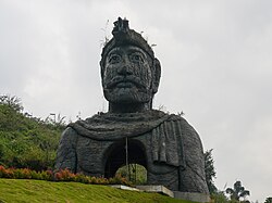 Kolumban statue, guide to Idukki project