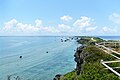 Eastern Cape (東半名碕　Higashi-hennazai) of Miyako Island in Japan. The most eastern point of the island having a white lighthouse at the very end.