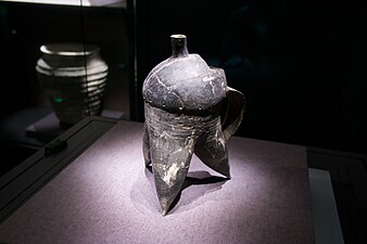 Black tripod vessel