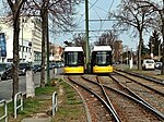 Zwei Flexity-Triebwagen (F8Z) an Gleisschleife Am Steinberg, der rechte Triebwagen kommt von Heinersdorf, 2022