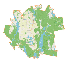 Mapa konturowa gminy Piecki, blisko centrum u góry znajduje się punkt z opisem „Piecki”