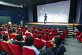 Laza addressing the public at the Rencontres du Film Court Madagascar competition screening, 2016.