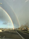 Een dubbele regenboog met duidelijke donkere band van Alexander tussenin (Knokke, België)