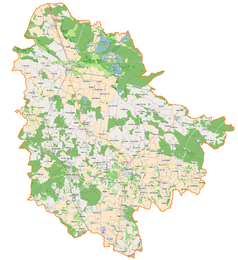 Mapa konturowa powiatu trzebnickiego, na dole znajduje się czarny trójkącik z opisem „Południowy Grzbiet”