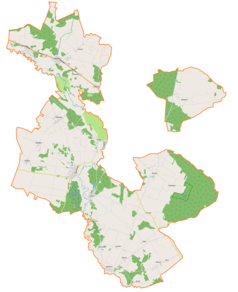 Mapa konturowa gminy Liw, blisko centrum po lewej na dole znajduje się ikonka zamku z wieżą z opisem „Zamek w Liwie”