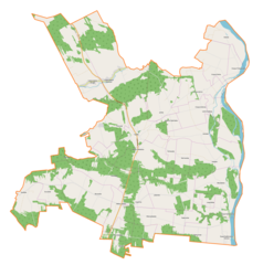 Mapa konturowa gminy Tarłów, w centrum znajduje się punkt z opisem „Tarłów”