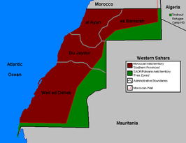 De Westelijke Sahara: ■ Bezet door Marokko ■ In handen van Polisario