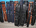 A variety of pool cue cases.