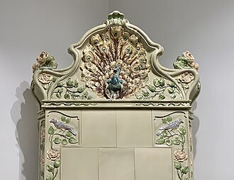 Art Nouveau acroterion of a stove in the Mița the Cyclist House (Strada Biserica Amzei no. 9), Bucharest, possibly designed by Nicolae C. Mihăescu,[9] 1908