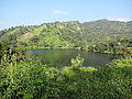 Image 18Bagakain Lake, also called Boga Lake is located in Ruma Upazila in Bandarban. It is a natural sweet and deep water lake situated nearly 1,246 feet (380 m) above sea level. The irregularly shaped lake is bounded on three sides by mountain peaks covered with thick bamboo bushes. Photo Credit: Masum Ibn Musa