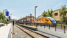 The Sprinter light rail train preparing to depart the platform at the Escondido Transit Center.