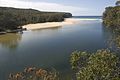 Lagoon with beach in background.