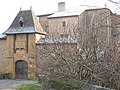 Fortified gateway with 13 blazons