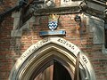 LCC plaque with the school name; the original name and date of the school is incorporated into the arch below the plaque.