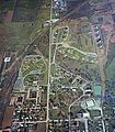 Aerial view of Parsons campus in 1964. Bowl of future Blum Stadium clearly visible