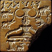 Proto-Shiva Stamp Seal; c. 2400-1900 BC; steatite; height: 3.6 cm; National Museum (New Delhi)[188]