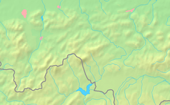 Mapa Beskidu Żywieckiego, Małego i Makowskiego z zaznaczoną granicą Polski, w centrum znajduje się czarny trójkącik z opisem „Mędralowa Zachodnia”